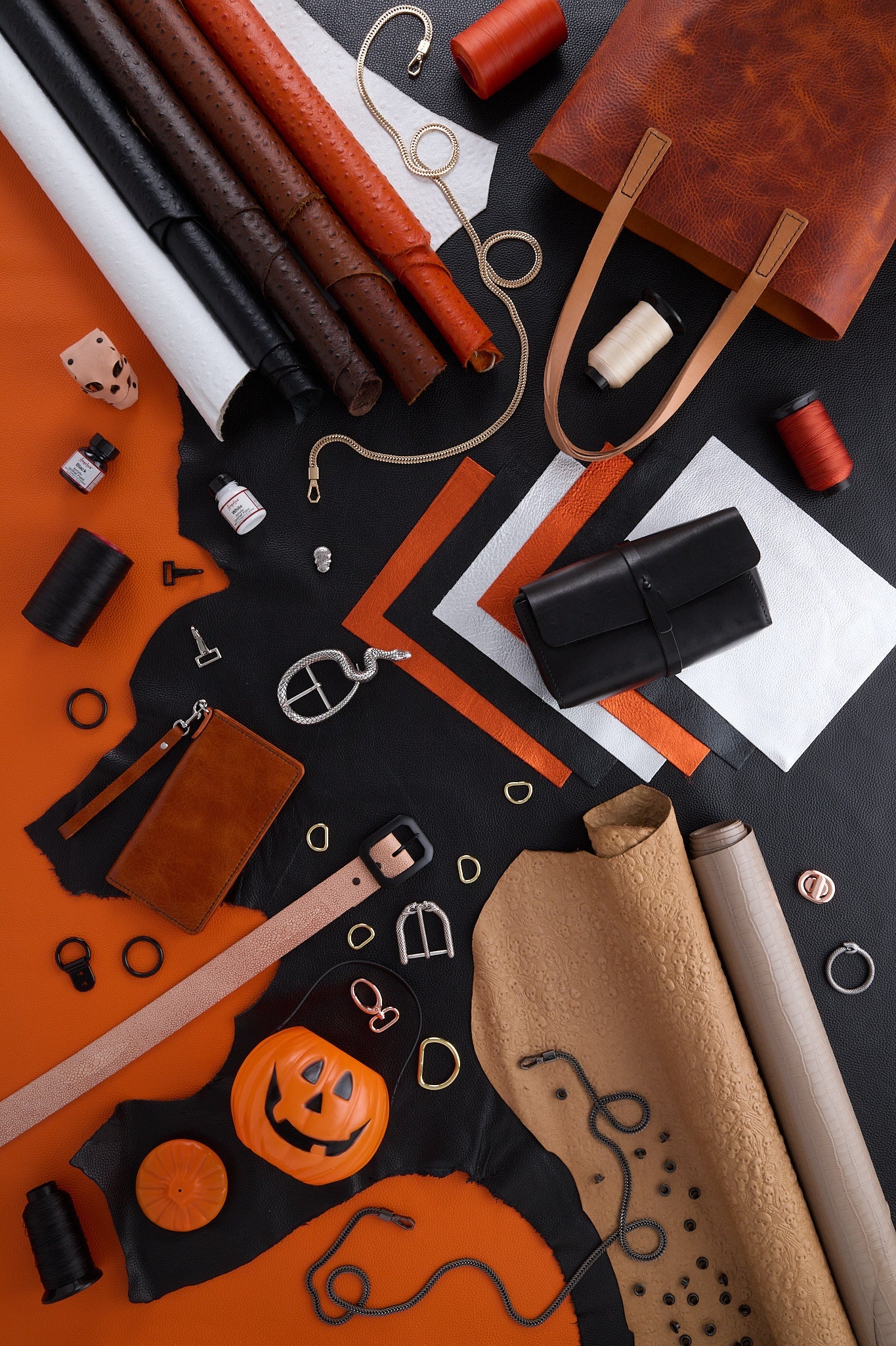 Halloween Haul: orange, black and white leather with hardware, thread and finished projects