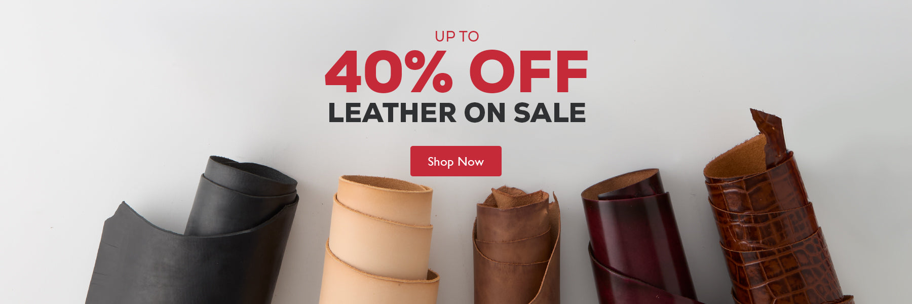Promotional banner for leather sales featuring several rolled leather samples in black, tan, brown, burgundy, and textured brown, with text reading 'UP TO 40% OFF LEATHER ON SALE' and a red 'Shop Now' button on a light gray background.