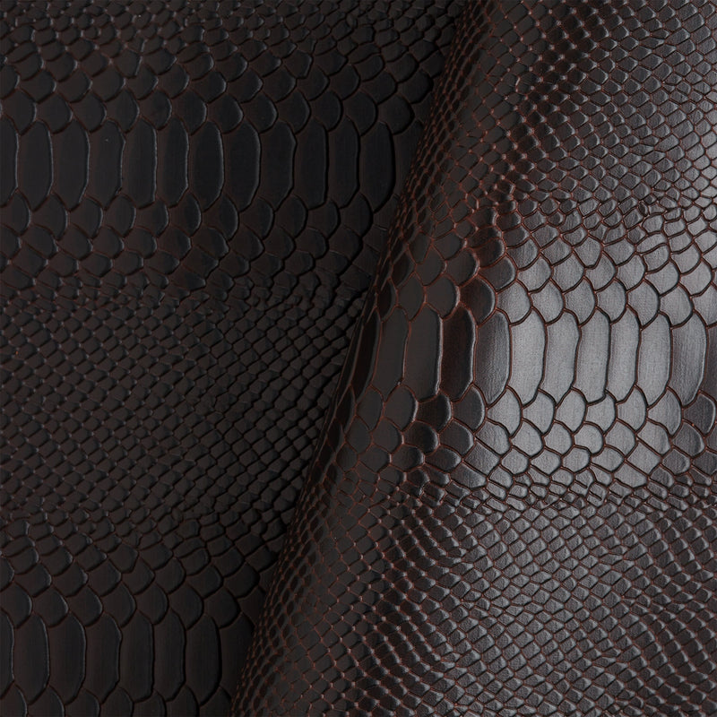 Épaule unique en cuir tanné végétal gaufré façon python