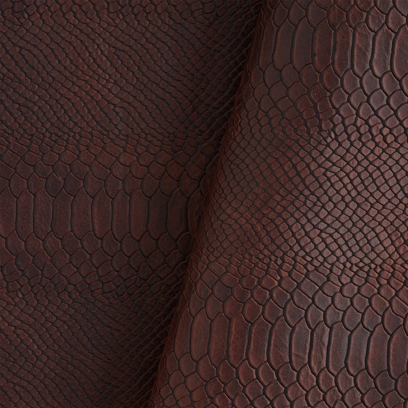 Épaule unique en cuir tanné végétal gaufré façon python
