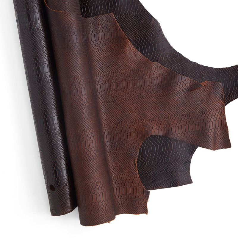 Épaule unique en cuir tanné végétal gaufré façon python